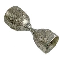 A 19th century Indian Swami silver double-ended spirit measure.