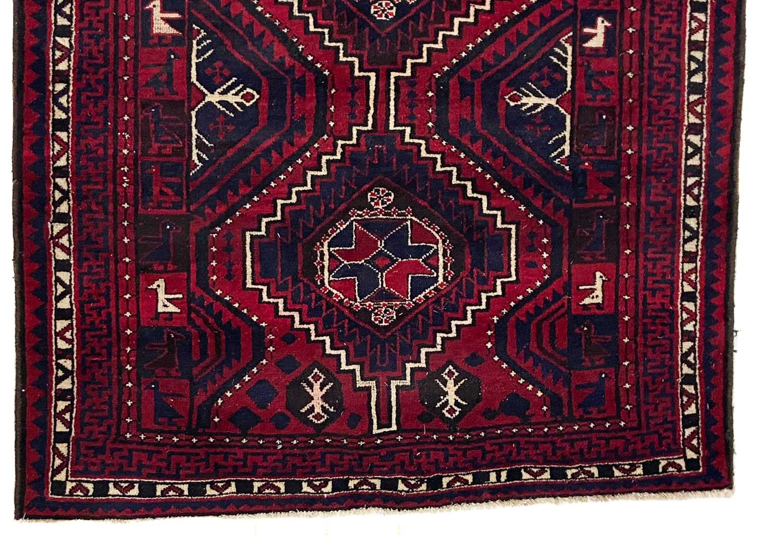 A South West Persian rug. - Image 2 of 3