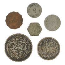 A selection of six Egyptian coins.