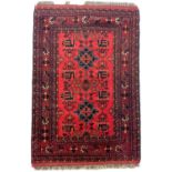 An Afghan rug, mid 20th century.