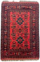 An Afghan rug, mid 20th century.