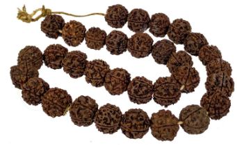 An Indian thirty-two rudraksha bead necklace.