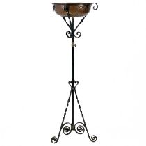 A late Victorian wrought iron adjustable lamp stand.