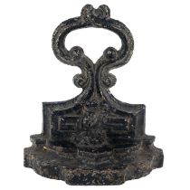 A cast iron doorstop.