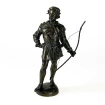 A bronze Robin Hood figure.
