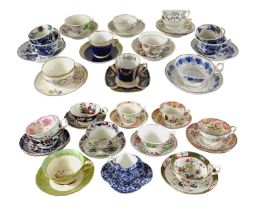 A collection of English porcelain tea cups and saucers.