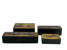 A group of four Russian lacquer boxes.