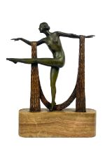 An Art Deco bronze of a female dancer on an onyx base.