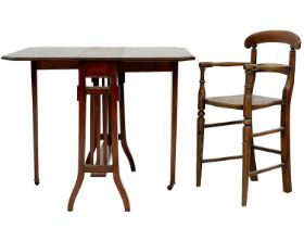 An Edwardian walnut Sutherland table.