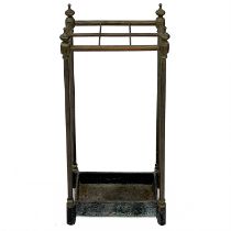 A late Victorian brass and cast iron stick stand.