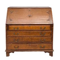 An early 20th century oak bureau.