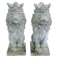 A pair of reconstituted stone lions.