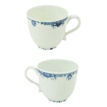 A pair of Worcester underglaze blue Lambrequin pattern tea cups.