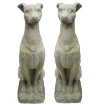 A pair of reconstituted stone Whippets.