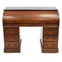 A Victorian mahogany cylinder top desk.