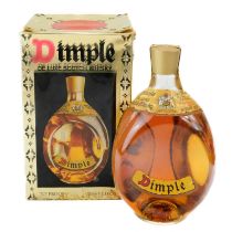 A bottle of Dimple De Luxe Scotch Whisky.