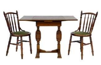 An unusual small oak draw leaf table.