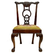 A George III mahogany dining chair.