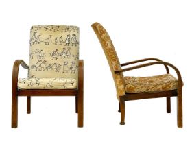 A pair of mid century Parker Knoll armchairs.