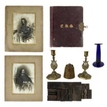 A pair of Victorian opaque glass portrait photographs.