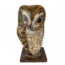 A hand painted owl figure by Jennifer Andrew.