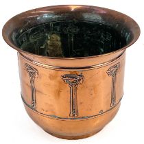 An Art Nouveau copper jardiniere by Beldray.