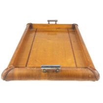 An Art Deco walnut and satinwood tray with chrome twin handles.