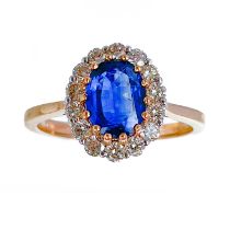 An 18ct rose gold certified kyanite and diamond cluster ring.