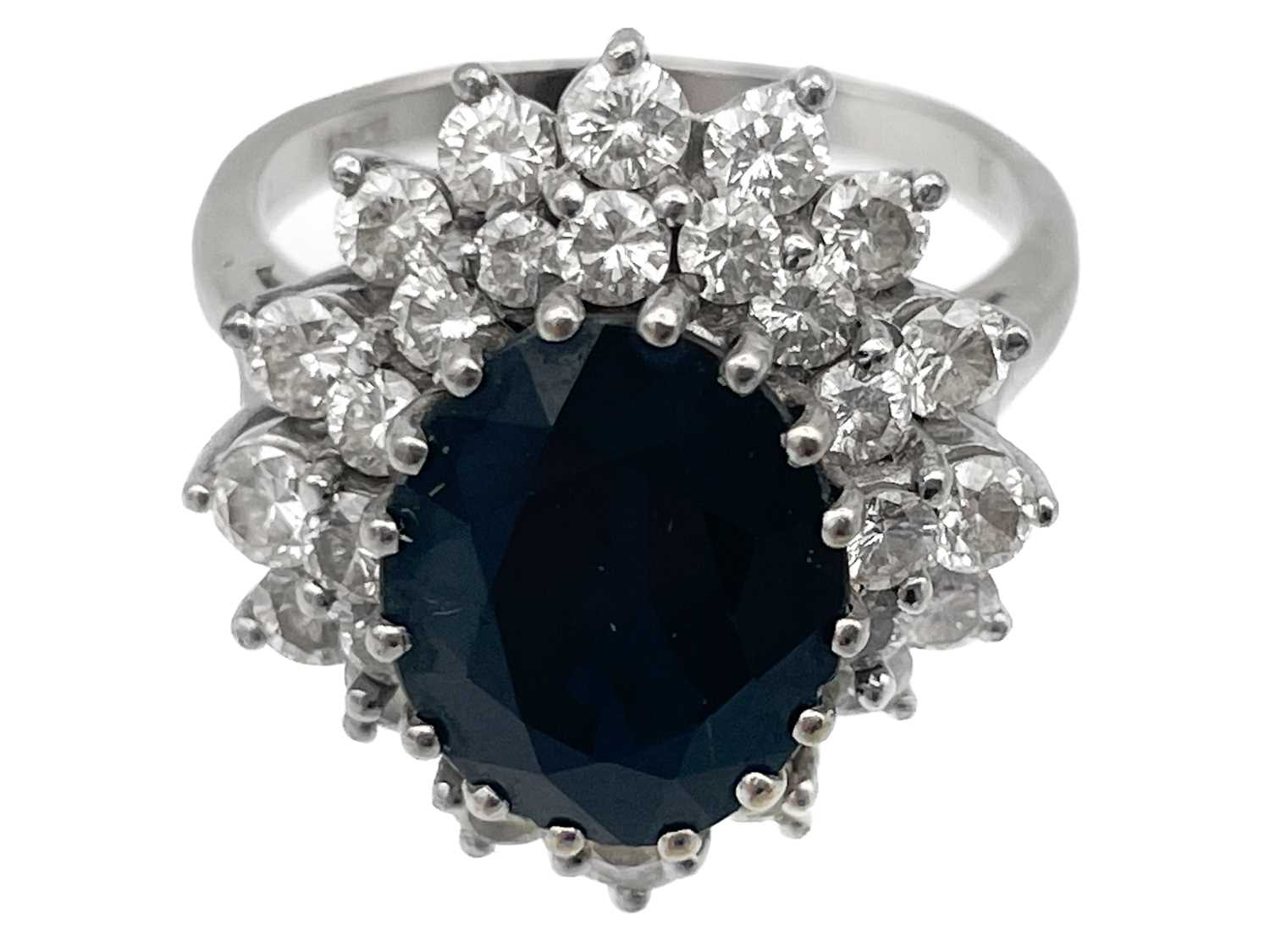 An 18ct white gold diamond and sapphire cluster ring with a pair of matching earrings. - Image 3 of 5