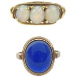 A 14ct white opal set three stone ring, and a cabochon blue spinel 14ct ring.