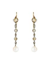 An Edwardian elegant pair of diamond and pearl pendant earrings.