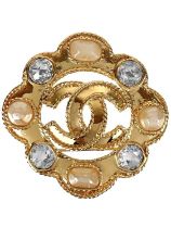 A Chanel 24ct gold-plated Gripoix and crystal CC circular brooch, circa 1995.