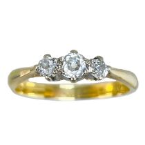 An 18ct and platinum diamond set three stone ring.
