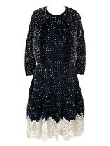 An Oscar De La Renta navy blue and white wool knitted dress and matching cardigan.