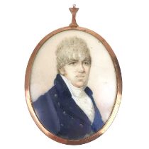 An early 19th century high purity rose gold (tests 14ct) framed portrait miniature.