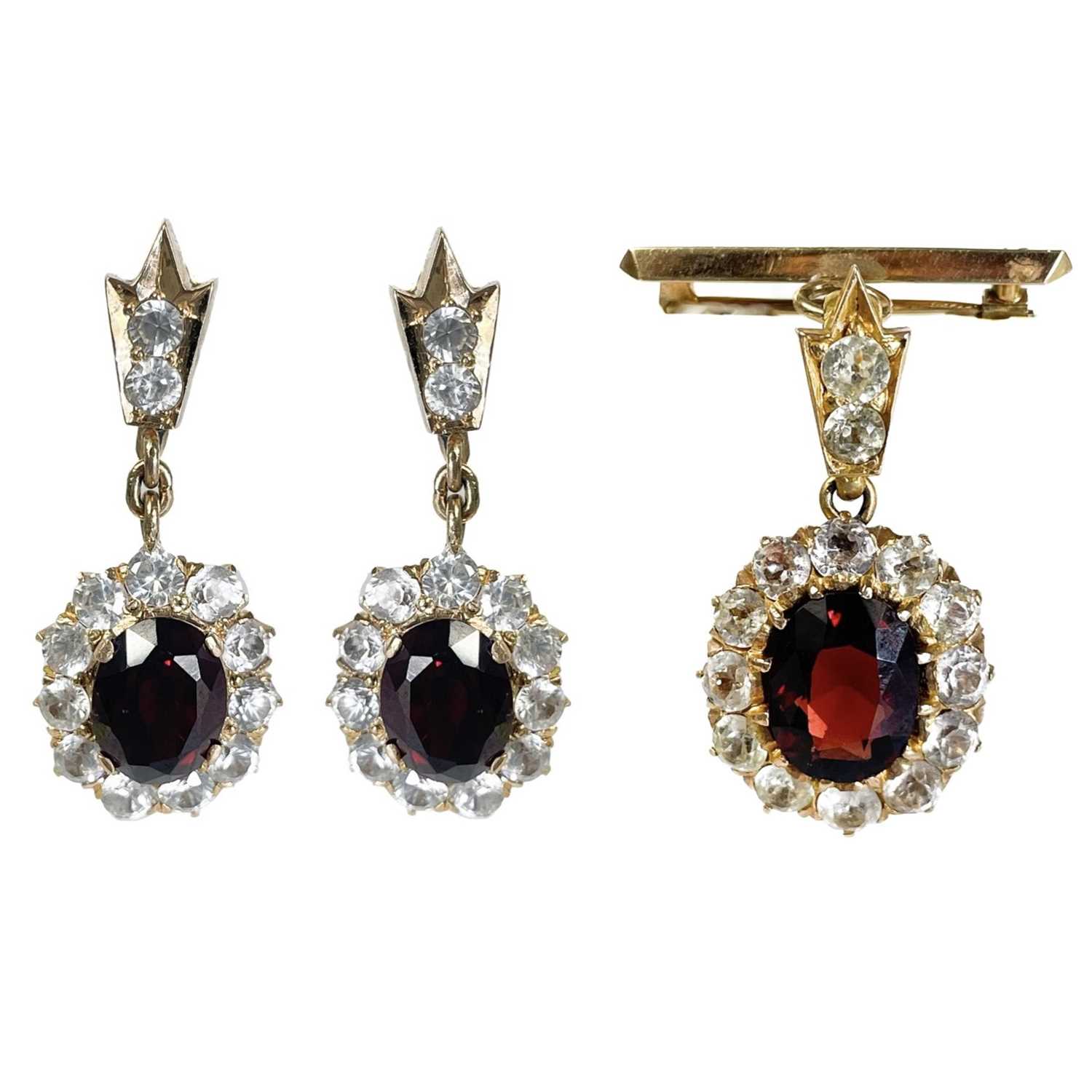 An attractive 14ct gold (tested) white sapphire and garnet cluster demi-parure.