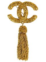 A Chanel 24ct gold-plated CC lava collection tassel brooch, circa 1993.