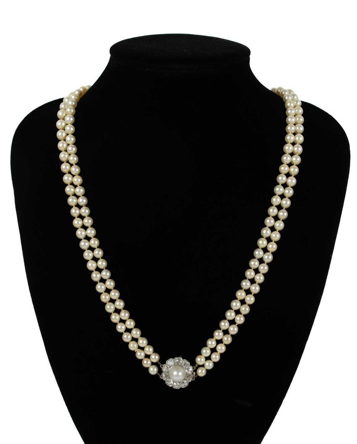 An impressive early 20th century cultured pearl, diamond set, double-row necklace & earrings suite. - Image 9 of 9