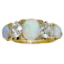 A good 18ct gold diamond and opal five stone ring.