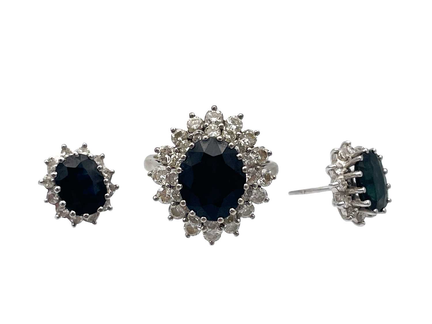 An 18ct white gold diamond and sapphire cluster ring with a pair of matching earrings. - Image 2 of 5