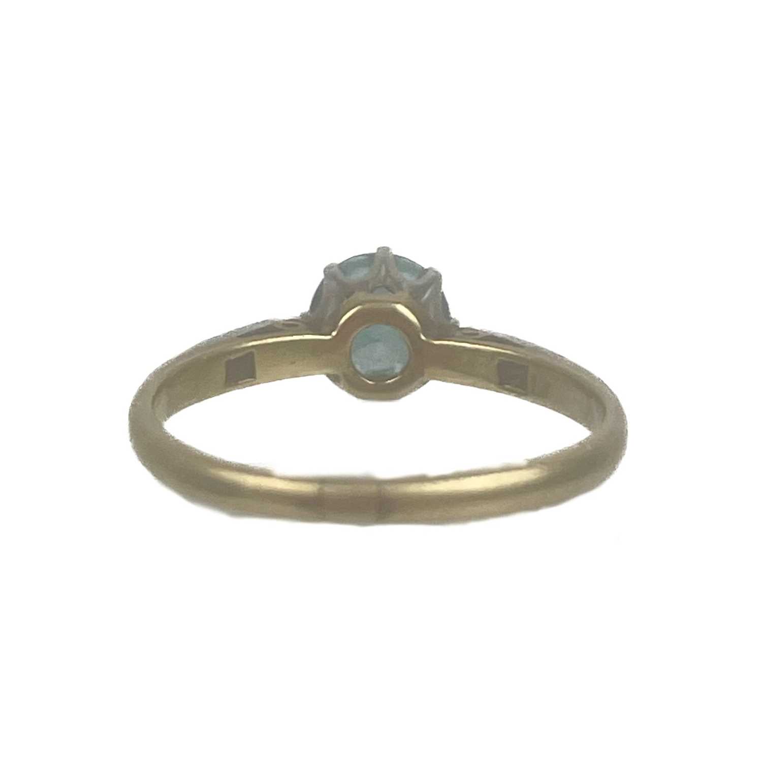 An 18ct and platinum blue topaz and diamond set solitaire ring. - Image 4 of 4