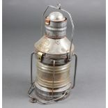 A 19th/20th Century coppered and brass masthead lantern, marked Buyers no.2931 56cm h x 27cm Most of
