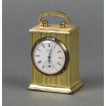Astral, a travelling clock, the 4cm enamelled dial with Roman numerals and subsidiary second hand,