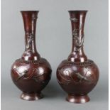 A pair of 19th Century Japanese bronze club shaped vases decorated birds 46cm h