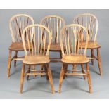 A set of 6 elm stick back Windsor chairs, raised on turned supports with H framed stretcher 87cm h x