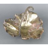 A Victorian embossed brass and copper leaf shaped dish decorated strawberry leaves and a moth 20cm x