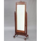 A 19th Century rectangular bevelled plate cheval mirror contained in a mahogany swing frame raised