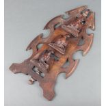 A Victorian pierced and carved walnut 3 section wall mounted letter rack decorated birds 39cm h x