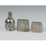 A Chinese silver repousse box decorated with figures and script, ditto decorated with figures and