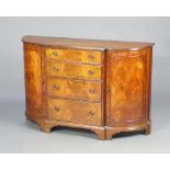 A Georgian style mahogany bow front sideboard fitted 4 graduated drawers flanked by bow front